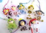1 Cute Resin Baby Doll Crystal Cellphone / Camera Charm - Random Color