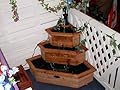 Alpine BAR112 Three Tier Wooden Corner Fountain Red