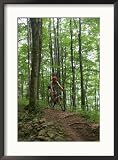 A Woman Rides a Mountain Bike on Props Run, a Single Track Trail Collections Framed Photographic Poster Print by Skip Brown, 14x15