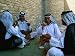 Men Drinking Tea Outside the Holy Shrine of the Imam Ali Ibn Abi Talib, an Najaf, Iraq Photographic Poster Print by Jane Sweeney, 24x18