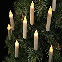 Shimmering Amber LED Candle Lights on Green Cable