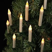 Shimmering Amber LED Candle Lights on Green Cable