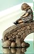 Praying Girl On A Stone Bridge Doorstop Statuary