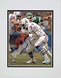 Earl Campbell Rushing Action Double Matted 8O x 10O Photograph (Unframed)