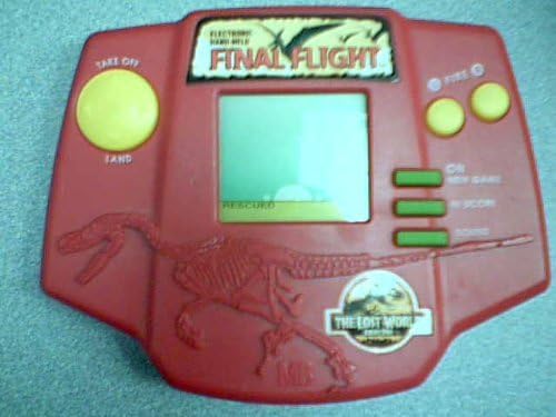 1996 Amblin Entertainment Universal City Studios MB Milton Bradley Jurassic Park The Lost World Final Flight LCD Electronic Hand-Held Game by Jrassic Park