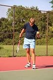 Young Man Serving Tennis Ball - 24