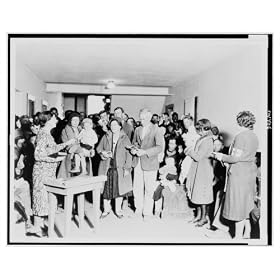 Historic Print (L): Applicants for Red Cross food orders while away the time in singing, instead of standing