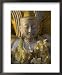 Close up of Small Buddha Figure with Flowers Round the Neck in the Shwedagon Paya, Yangon, Myanmar Religion & Philosophy Framed Art Poster Print by Eitan Simanor, 18x22