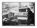 Newswire Photo (L): Miss E. H. Dodd in room various aeronautical displays