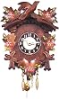 German Black Forest Clock - Carved Brown With Flowers German Black Forest Clock - Carved Brown With Flowers