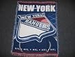 NEW YORK RANGERS 48"x 60" Triple Woven Jacquard Knit Throw Blanket