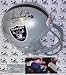 Howie Long Autographed/Hand Signed Oakland Raiders Full Size Deluxe Replica Football Helmet with HOF