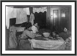 Historic Print (S): Mrs. Mary Rena, 46 Laight St., 3d floor front, picking nuts with dirty baby in lap. Two