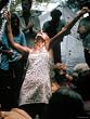 Young Woman with Flute Ecstatically Raising Her Arms, Amid Crowd at Woodstock Music Festival Photographic Poster Print by Bill Eppridge, 30x40