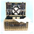 The CHELMER CLASSIC DE LUXE 4 Person Green Willow Picnic Hamper with china plates, wine glasses, s/s cutlery, bottle opener, bottle stopper, chopping board, white napkins and tablecloth
