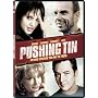 Pushing Tin