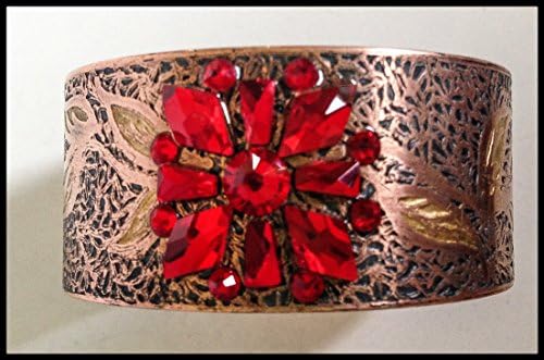 Art deco inspired, etched brass cuff bracelet accented with Swarovski crystals, Gilders Paste and liver of sulphur.