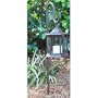 Six sided brown solar lantern with shepherd's hook pole.
