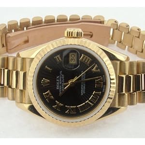 Ladies gold Rolex watch datejust black roman dial lady