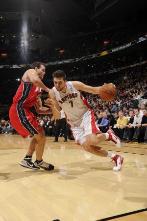 New Jersey Nets v Toronto Raptors: Andrea Bargnani and Kris Humphries Photographic Poster Print by Ron Turenne, 16x24