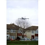 10x8 Photograph (25x20cm) Low-flying over houses from Flightglobal'