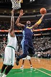 Denver Nuggets v Boston Celtics: Nene and Shaquille O'Neal Photographic Poster Print by Brian Babineau, 8x12