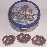 Scott's Cakes 1 lb. Milk Chocolate Covered Pretzel with Chocolate Chips in a Homestead Tin