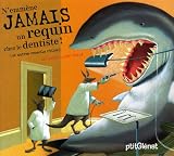 N'emm�ne jamais un requin chez le dentiste !