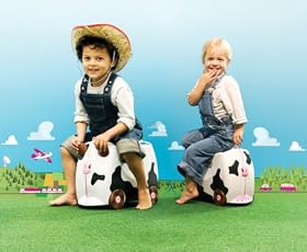 Kids sitting on Freda Trunki children's suitcases