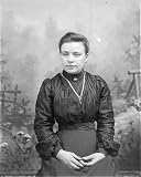 Photographic Prints of Young Edwardian woman in studio photo, Mid Wales from Mary Evans