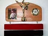 Martial Arts Belt Display with a Kick ! Signature Oak.
