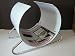 Stylish round magazine rack - White color and chrome. Dim 41 x 30 x 32 cm, Weight 3 kgs.