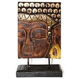 A BEAUTIFUL HAND CARVED BUDDHA PLAQUE ON A STAND