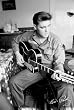 Elvis Presley - B&W Personality Poster (Sitting with Guitar) (Size: 24" x 36")