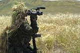 A Combat Videographer Practices Evasion Techniques. - 24