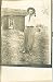 Man In Front Of Sod Roofed House Postcard