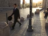 IMAGE OF Young Orthodox Jew Dressed for the Sabbath Prayers Walking to the Western Wall at Sunset Premium Photographic Poster Print by Eitan Simanor, 30x40