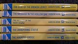 5 Nancy Drew hardcover book set: 11 THE CLUE OF THE BROKEN LOCKET / 12 THE MESSAGE IN THE HOLLOW OAK / 13 THE MYSTERY OF THE IVORY CHARM / 14 THE WHISPERING STATUE / and 15 THE HAUNTED BRIDGE