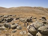 Two People Explore an Archeological Site on Pleitito Creek,
California Artists Photographic Poster Print by Rich Reid, 9x12