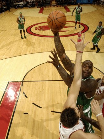 Boston Celtics v Toronto Raptors: Shaquille O'Neal and Andrea Bargnani Photographic Poster Print by Ron Turenne, 48x64