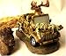 Deer Driving Jeep with Hunter Strapped to Hood Figurine