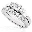 3/8ctw Three Stone Round Brilliant Diamond Wedding Ring Set in 14Kt White Gold (HI/I1-I2)