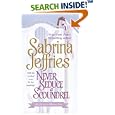 Never Seduce a Scoundrel (School for Heiresses)