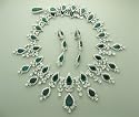 Platinum and 18k Gold Emerald and Diamond Set