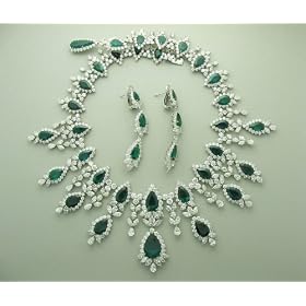 Platinum and 18k Gold Emerald and Diamond Set by Almaz