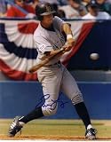 Autographed 8x10 Photo Evan Longoria - Colorado Rockies / Long Beach State Baseball Autographed (Certificate of Authenticity: NAXCOM Authenticated) EX - Ex. or Better