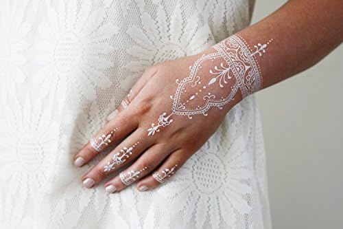 White henna style hand temporary tattoo