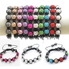 The latest trend in designer jewellery - Crystal Ball Friendship Bracelets. 7 coloured crystal disco balls with 4 macrame beads. Fully adjustable and fits any size wrist - Red
