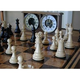 The House of Staunton 4.0 inch Classic Series Chessmen in Ebonized Boxwood