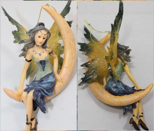Rock Metal Fantasy Gothic Fairy in a Flowing Short Blue Dress Sitting on on a Half Moon. She is a Hot Beautiful Woman.Ornament is approximately 5.5 inches long & arrives in a Brown Gift Box. Perfect Christmas Ornament for the Fairy Lover or Teenage Girl in Your Life!!!